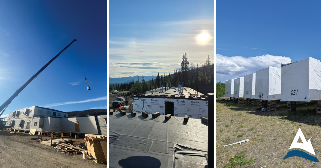Tasu crew craning and installing modular units at a Yukon mine-site camp, with modules staged on cribbing and wrapped for transport